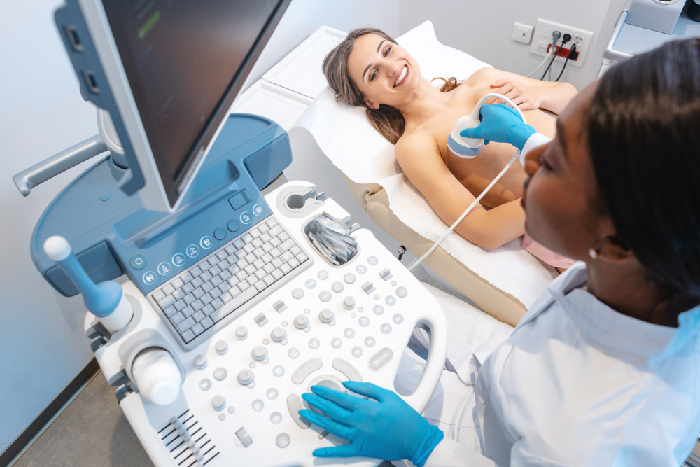 Preemptive ultrasound mammography done by gynecologist on modern machine