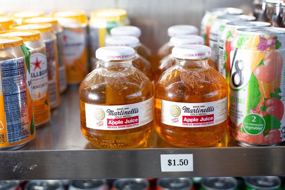 Los Angeles, California, United States - 10-02-2021: A view of several glass bottles of Martinelli's apple juice, seen at a local convenient store.
