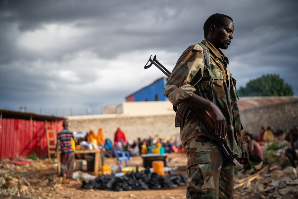 Baidoa, Somalia May 15 2019: soldier on duty to protect people during dinner