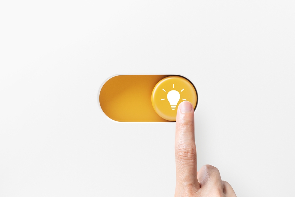 On and off toggle switch buttons with idea light bulb icon, Creative and idea sign, solution, thinking concept. Hand of woman turn on sign of innovation and success, 3D rendering.