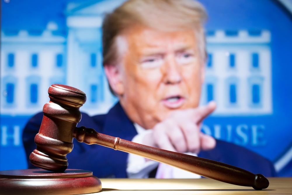 Syktyvkar, Komi, Russia, April 2, 2023, Trump and the court session. The judicial Hammer on the background of Trump.