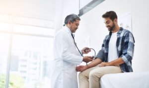doctor examining patient