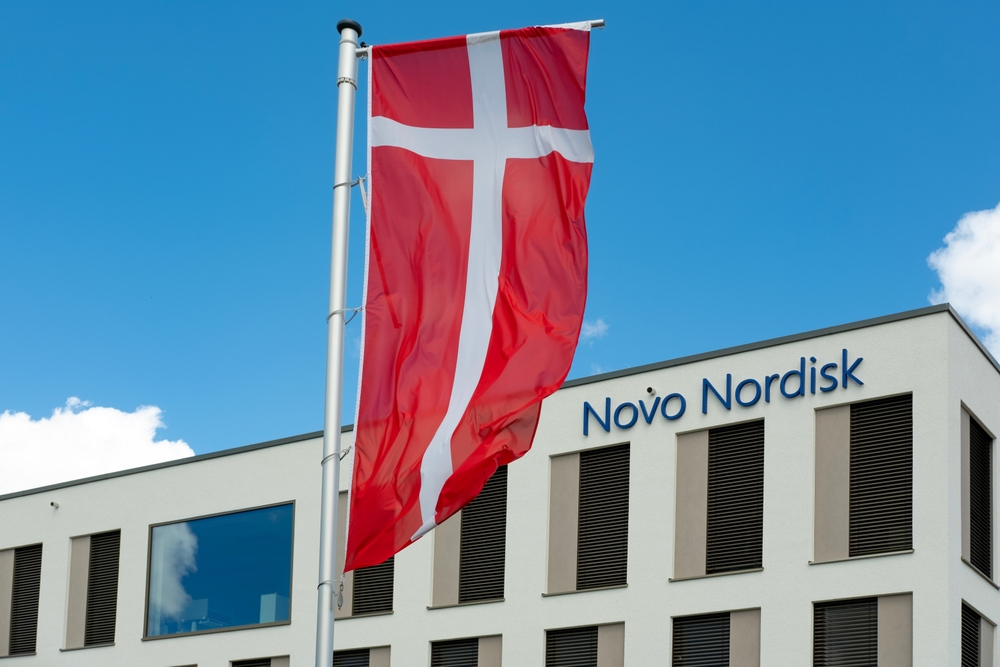 Novo Nordisk advertising flags and logo on facade, Danish pharmaceutical healthcare giant Novo Nordisk AS, production innovative drugs, obesity treatment Ozempic, Mainz, Germany – June 15, 2024