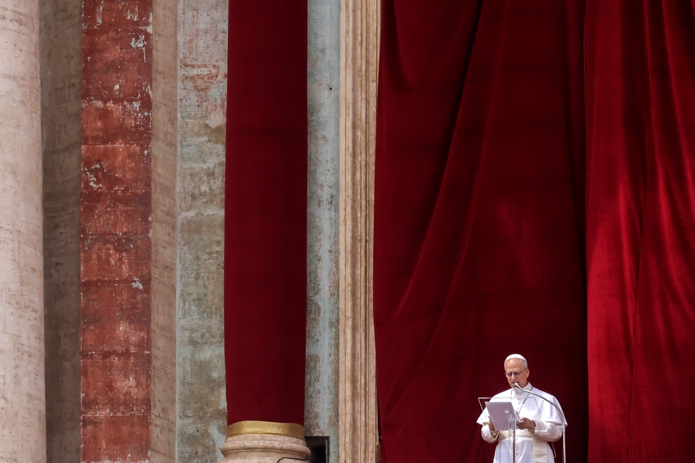 VATICAN CITY, VATICAN - 11 MAY 2025: Pope Leo XIV leads the Regina Coeli prayer from the central loggia of St. PeterÕs Basilica.