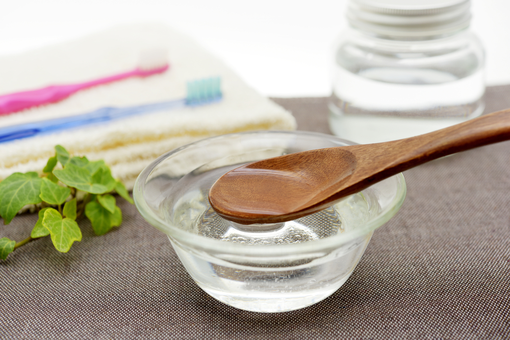 Coconut oil pulling - image of oral care