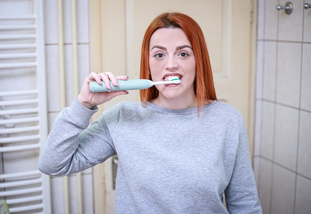 woman brushing teeth