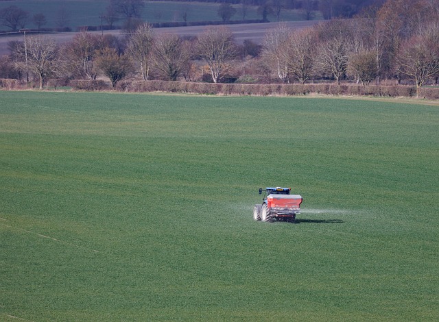 tractor spraying crops