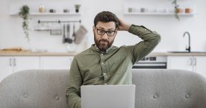 15+ Mysterious Items That Ended Up Being Easy to Identify confused man looking at a laptop screen