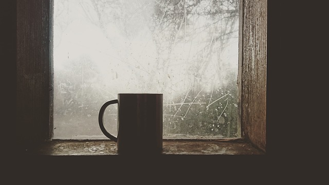 cup of coffee on windowsill