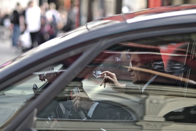 man driving in a car