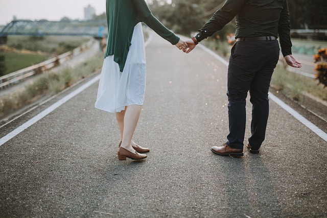 couple walking hand-in-hand