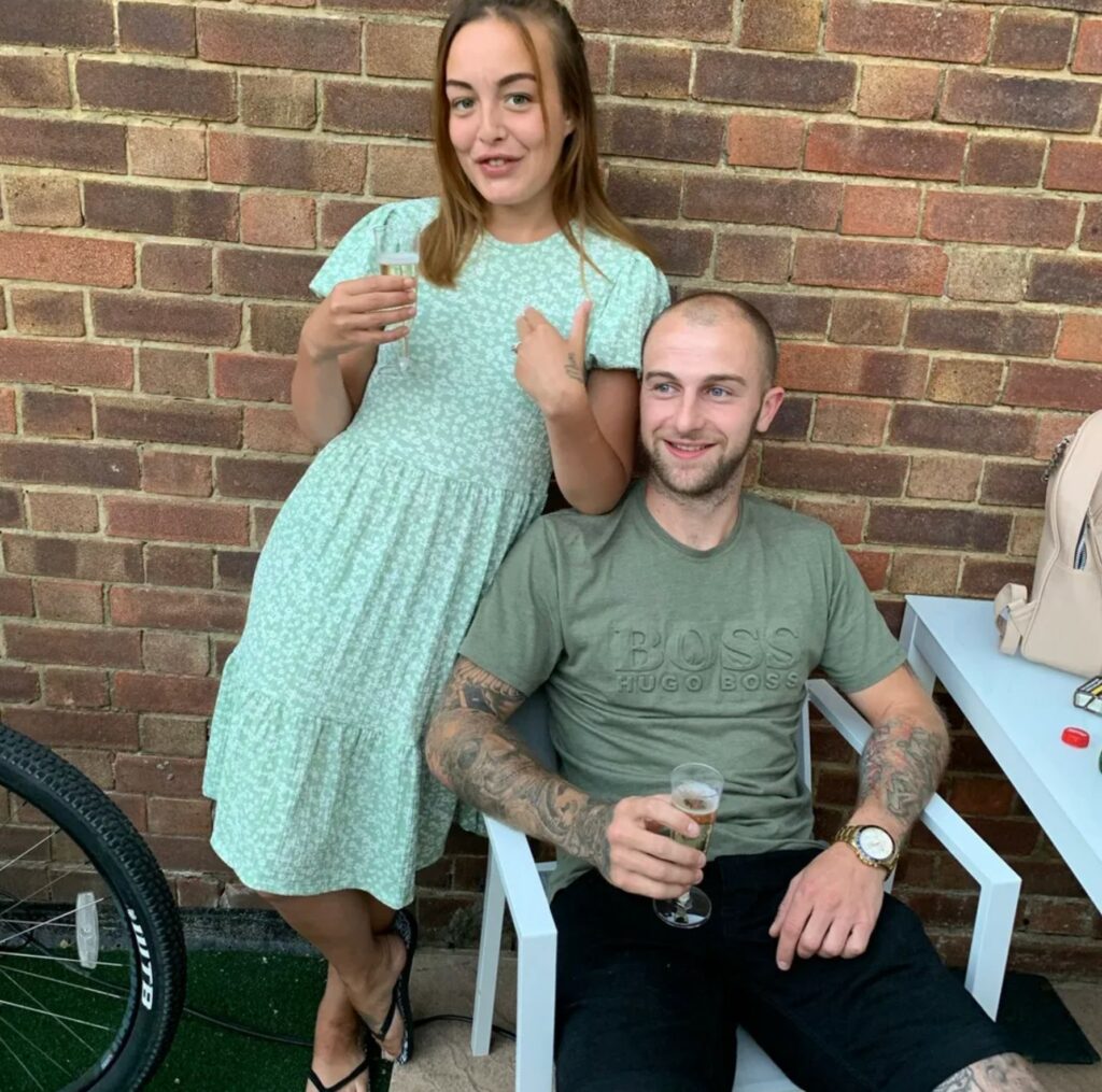 Beth Martin with Luke outside