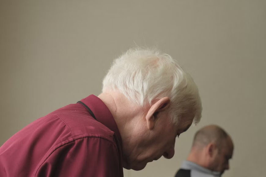 side profile of eldery man. Old people smell can often appear behind the ears and neck.
