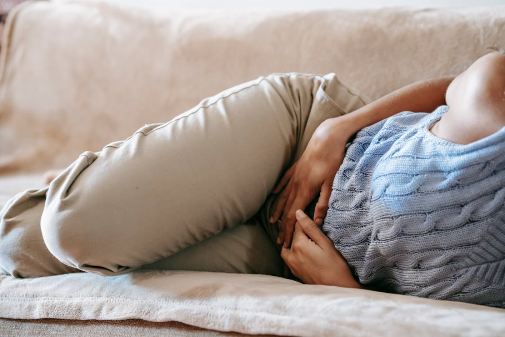 Person Suffering from a Stomach Pain