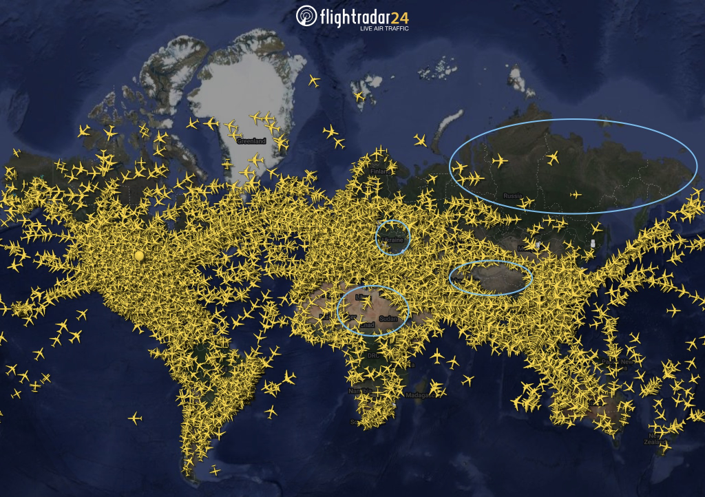 World map showing flight paths with blue circles marked over the gaps where Ukraine, Iran, Tibet, and Central Africa are.