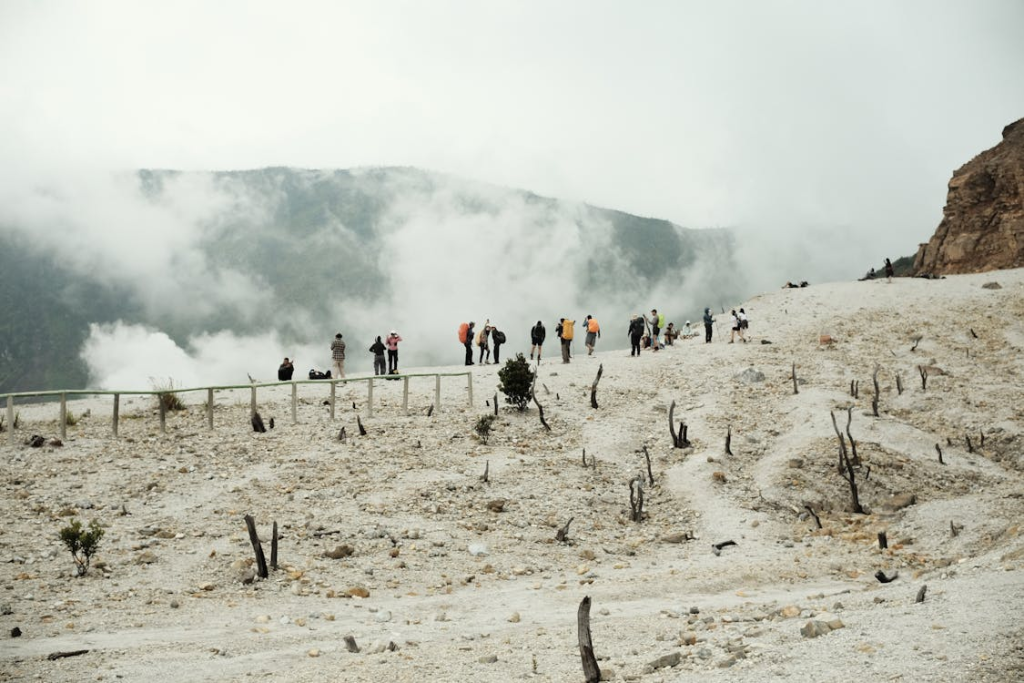 Tourists Exploring a Volcanic Landscape
