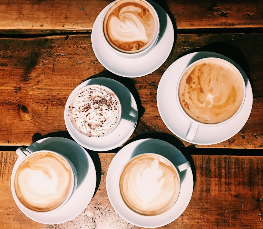 Close-Up Shot Coffee Drinks on Wooden Surface