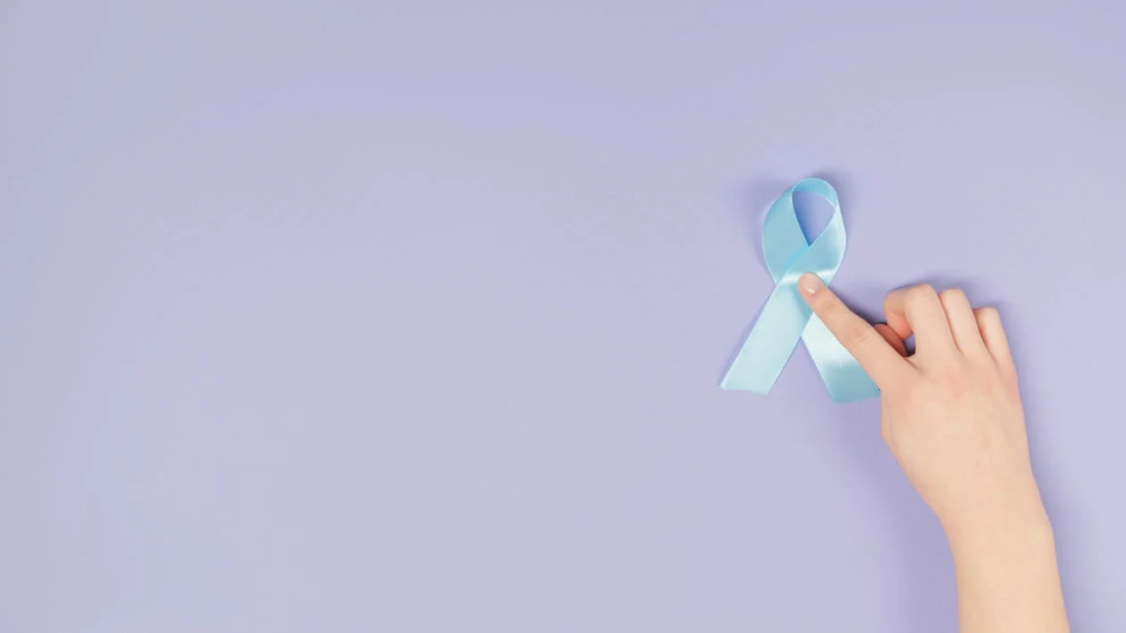 A Hand Touching a Blue Ribbon