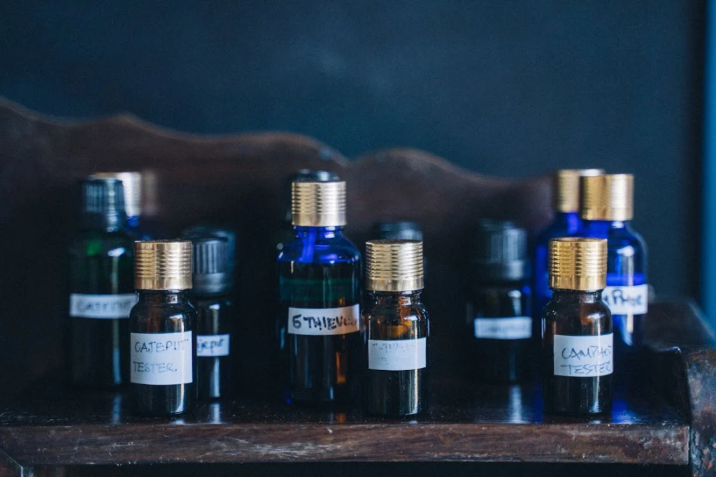 Bottles of Essential Oils on a Shelf