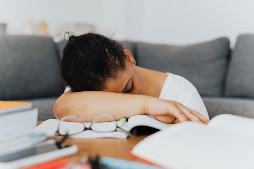 A Woman Sleeping on the Table