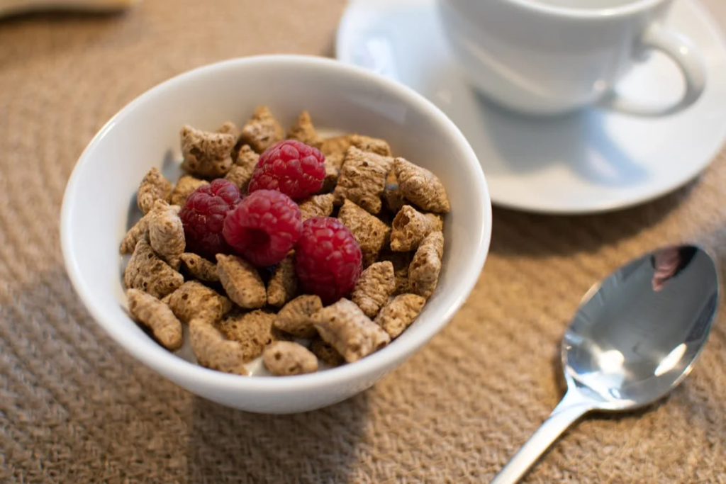 Bowl of Cereals with Raspberries