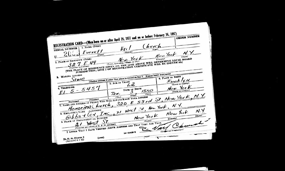 Completed WWII draft registration form showing personal details including name, address, and physical characteristics handwritten in black ink.