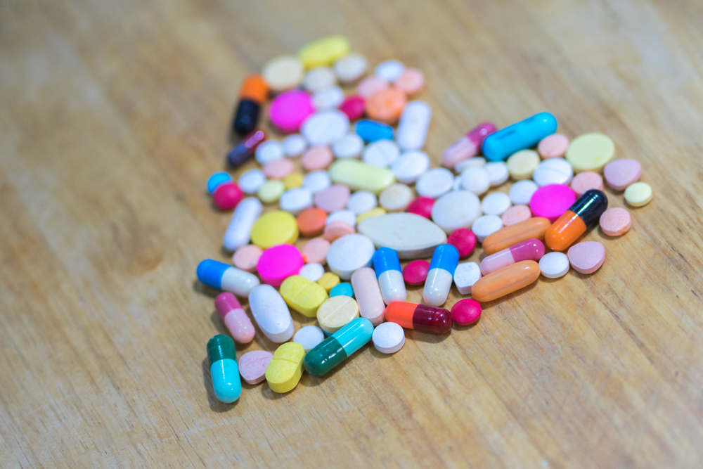 Selective focus of pills form into heart shape
