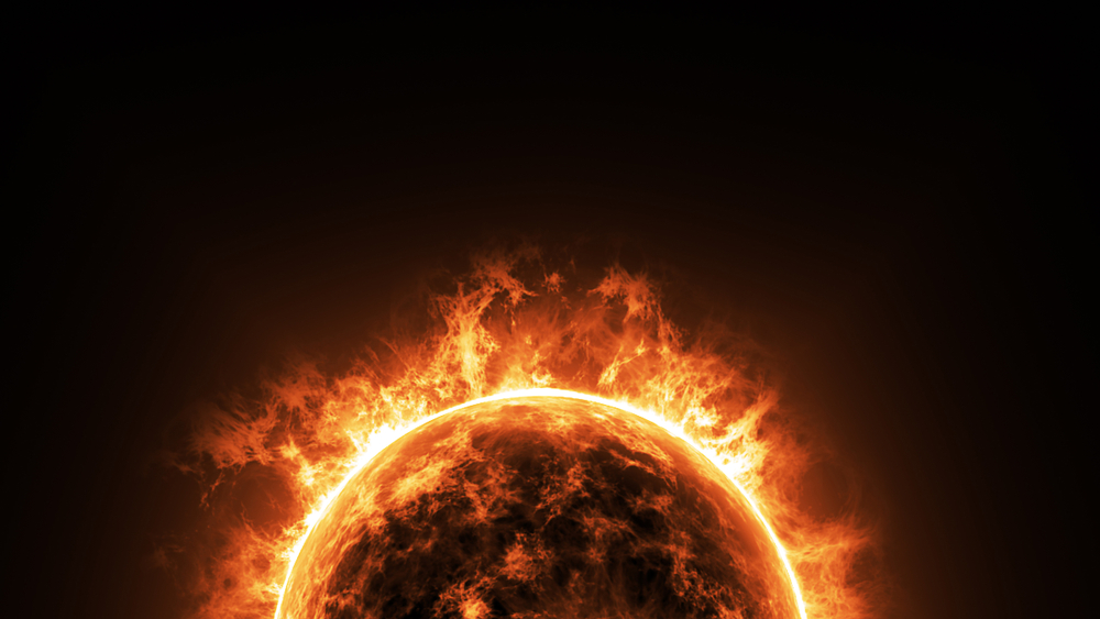 a big sun surface with solar flares and copy space on black background, global warming concept. Abstract scientific in universe background.