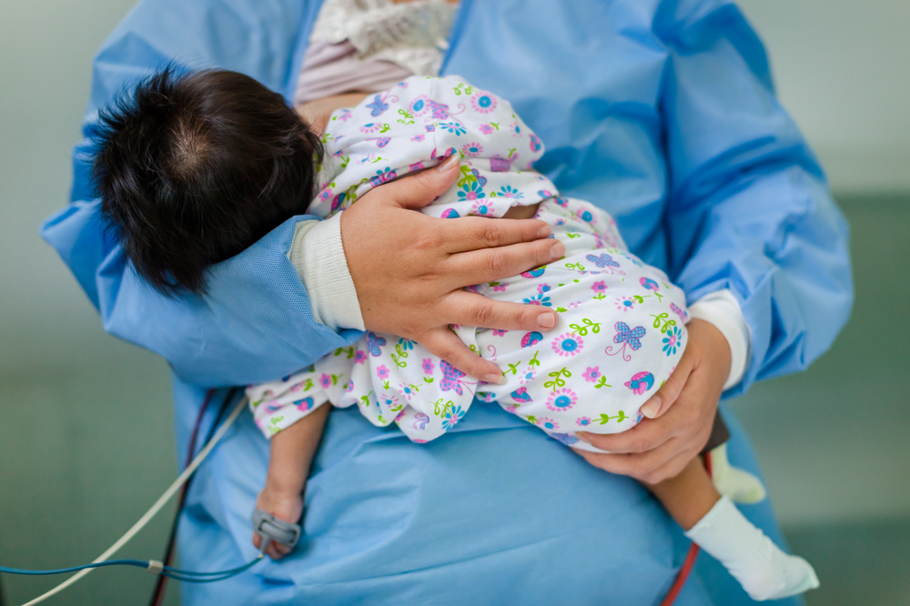 LIMA, PERU - JANUARY 29, 2014: Heart surgery performed at Dos de Mayo Hospital. Children recovering from surgery.