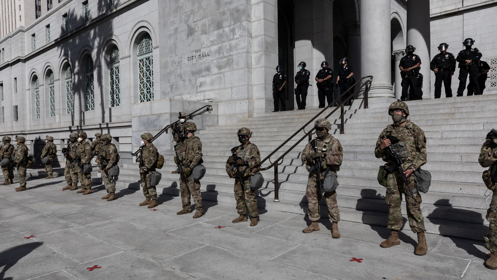 Los Angeles / California - May 31 2020 National Guards and cops protecting City Hall in Downtown