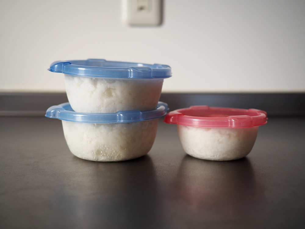 Frozen rice in plastic container for stock