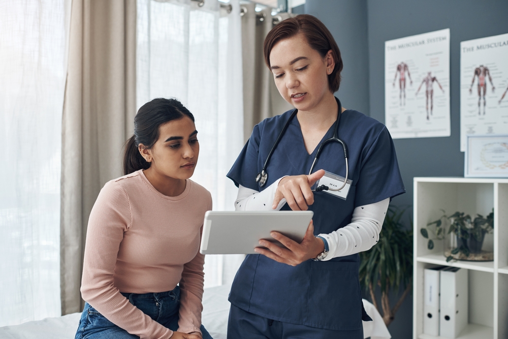 These are all the possible causes. Shot of a young female doctor talking to a patient in an office.
