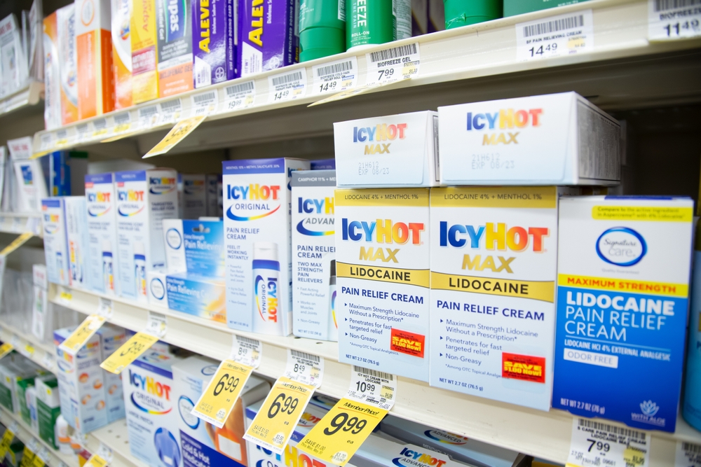 Los Angeles, California, United States - 05-20-2022: A view of several packages of IcyHot products, on display at a local grocery store.