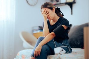 Extremely High Blood Pressure Symptoms You Should Never Ignore Woman,Taking,Her,Blood,Pressure,Feeling,Nauseated,And,Ill.,Person