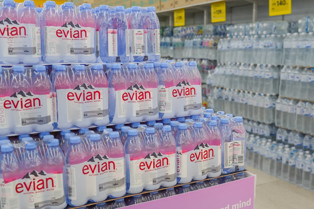 Evian Water is natural mineral water created from rain and snow in the French Alps packed in polyethylene. Sold on shelves in department stores. Thailand, Bangkok 25 december 2023.