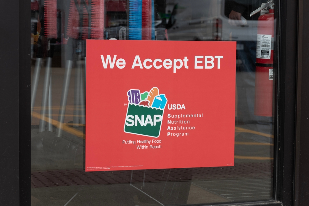 Brookville - April 21, 2024: SNAP and EBT Accepted here sign. SNAP and Food Stamps provide benefits to help the budgets of disadvantaged families.