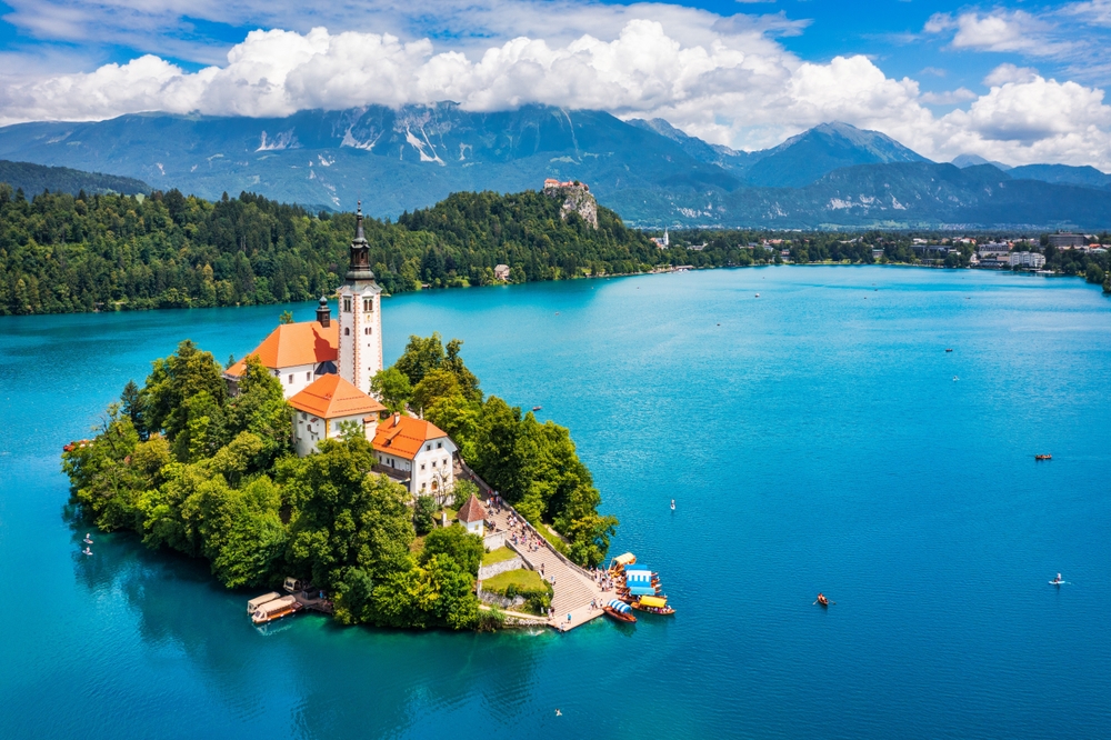 Lake Bled in Slovenia. Beautiful mountains and Bled lake with small Pilgrimage Church. Bled lake and island with Pilgrimage Church of the Assumption of Maria. Bled, Slovenia, Europe.