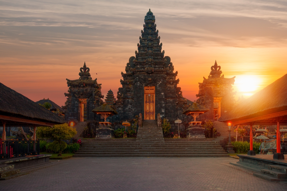 Pura Besakih temple on the slopes of Mount Agung largest and holiest temple at sunset - Bali, Indonesia