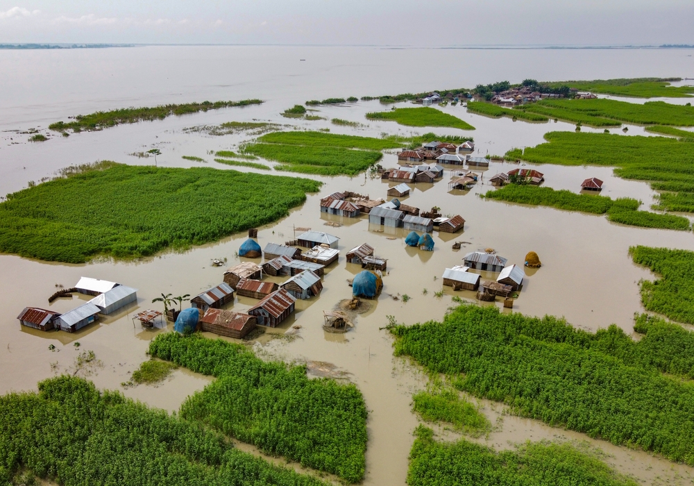 Aerial view of flood affected villages nearby Jamuna river in Northern Bangladesh, highlighting the submerged homes, affected communities, highlighting the severe impact and the resilience