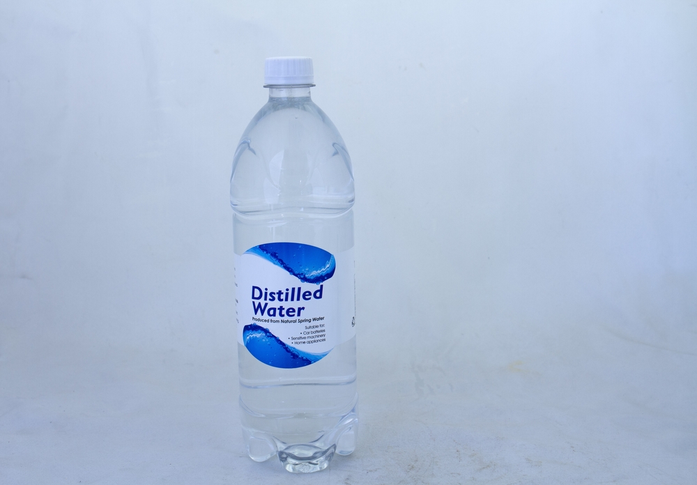 Johannesburg, South Africa - September 13, 2024: a bottle of distilled water bottled by Source Panalo isolated on a clear background with copy space