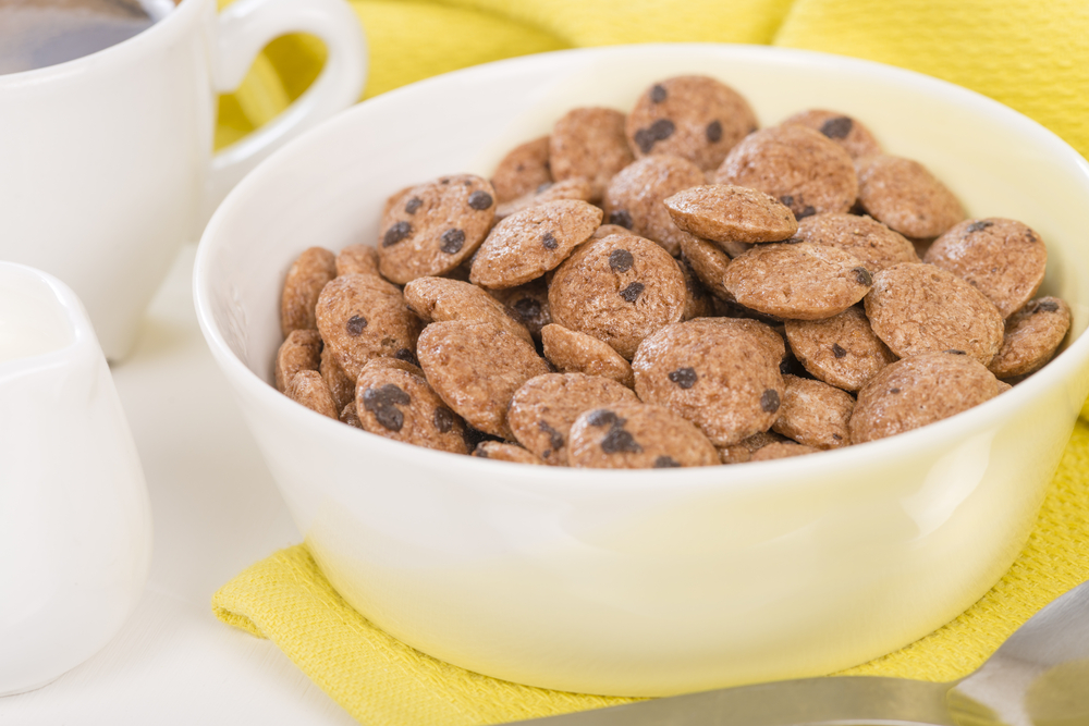 Cookie Crisp - Chocolate chips cookies cereals in yellow bowl.