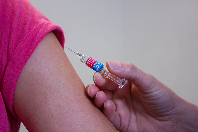 syringe next to arm
