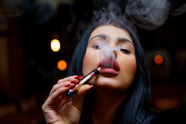 a woman vaping