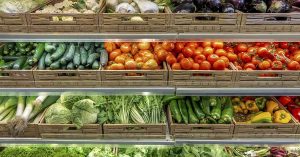 Top U.S. Vegetable Found to Carry Highest Level of Pesticide Residue various types of produce in a grocery store setting