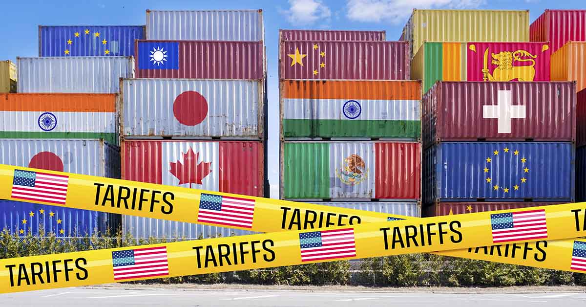 Shipping containers with various contries flags on them with yellow tape showing an American flag and the word Tariffs. Tariff concept