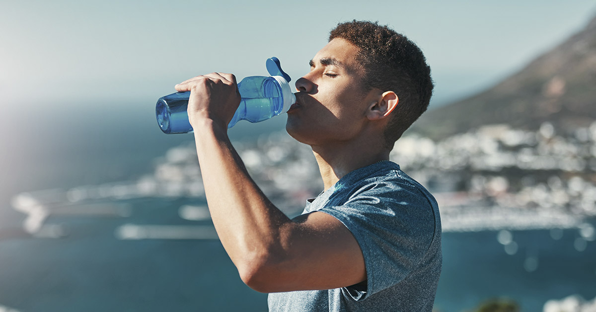 man drinking water