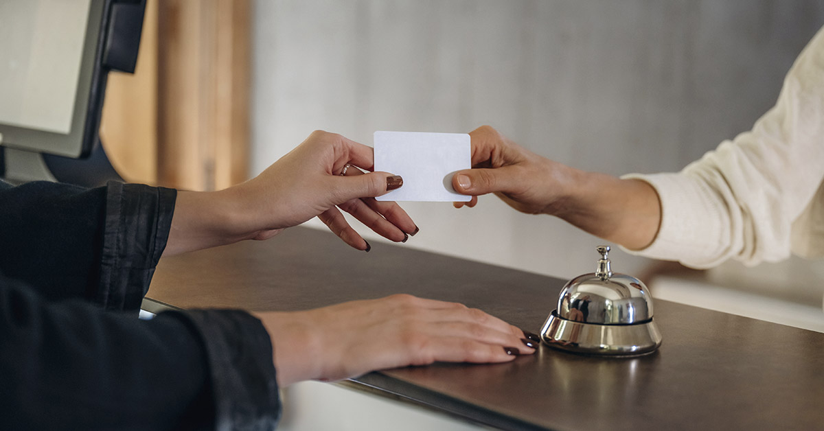person checking in at a hotel