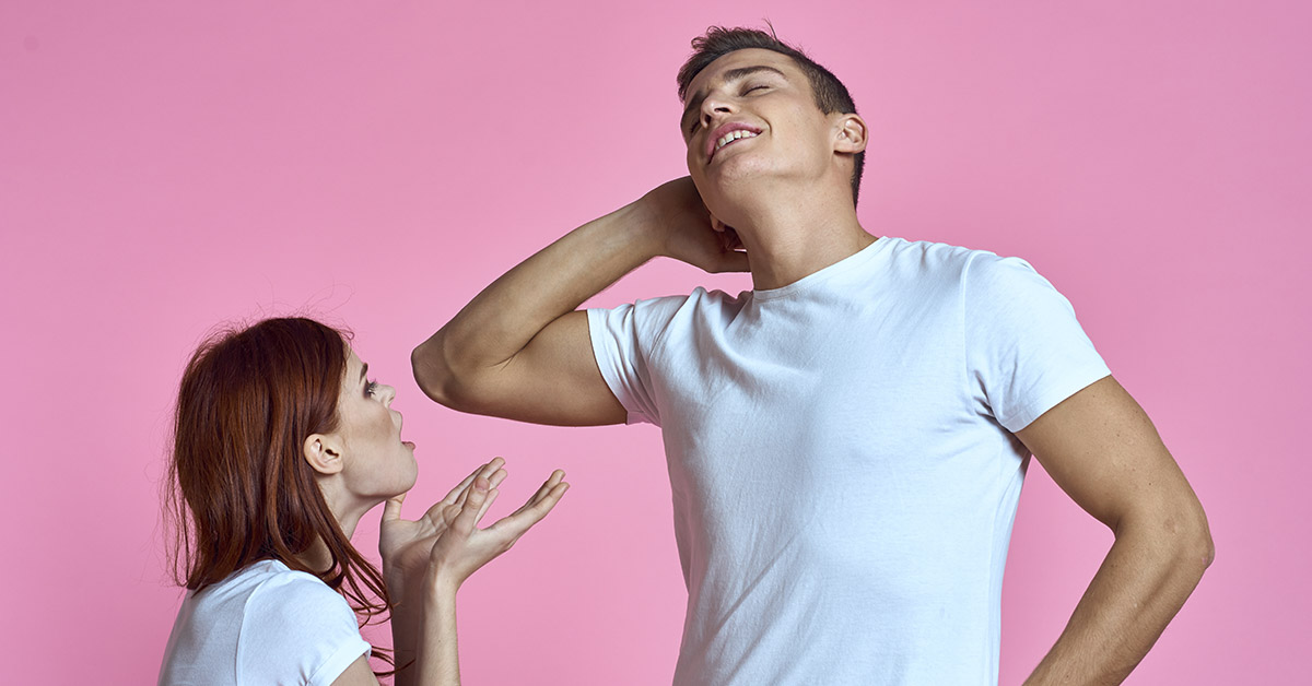 Woman speaking to narcissistic man with pink background