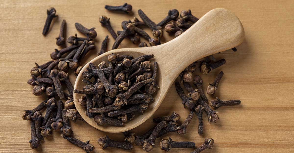 mound of gloves on a wooden spoon