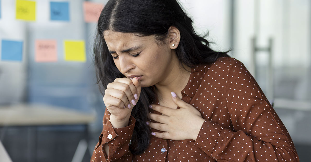 woman coughing